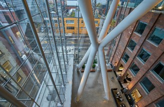 Looking down through a full-height glazed atrium